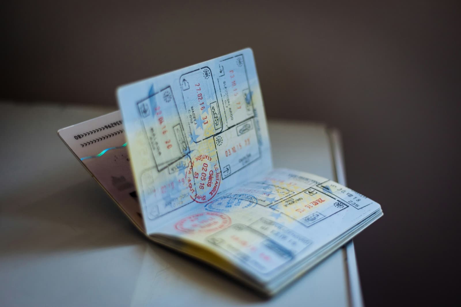 Passport open to visa stamps